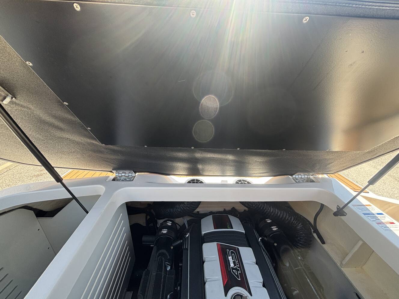 A photo of this 2018 Sea Ray 210 SPX w/MerCruiser 4.5L - 250HP Engine and Trailer