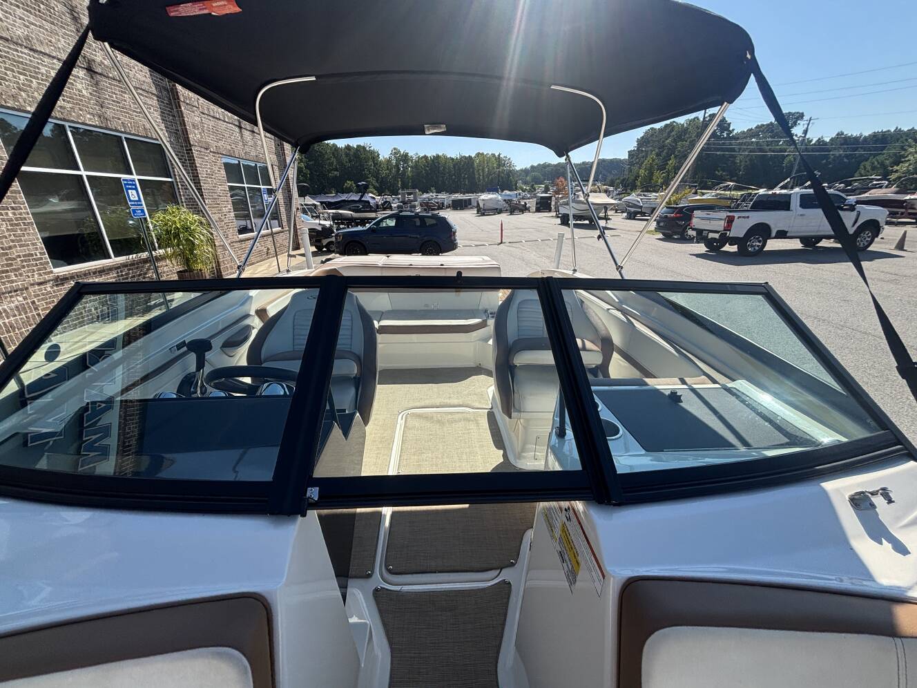 A photo of this 2018 Sea Ray 210 SPX w/MerCruiser 4.5L - 250HP Engine and Trailer