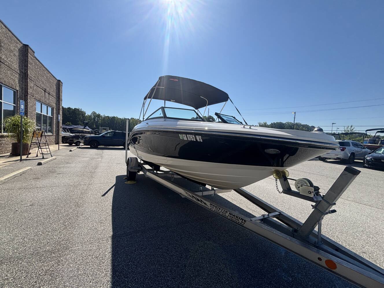 A photo of this 2018 Sea Ray 210 SPX w/MerCruiser 4.5L - 250HP Engine and Trailer