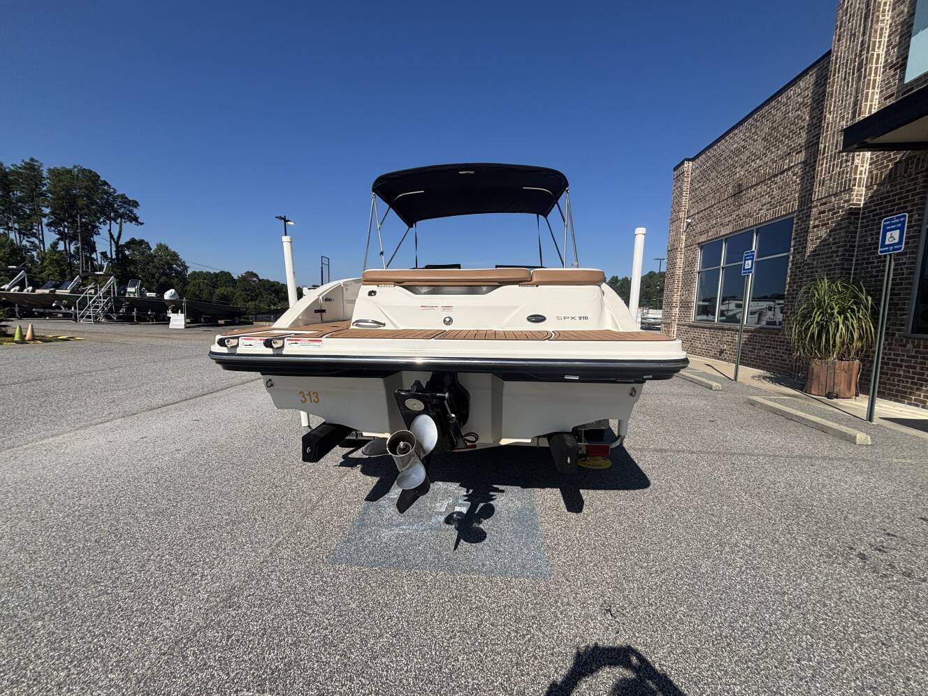 A photo of this 2018 Sea Ray 210 SPX w/MerCruiser 4.5L - 250HP Engine and Trailer