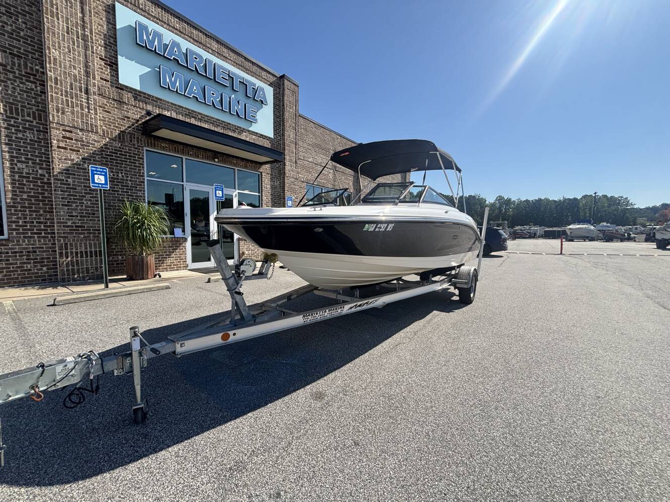 A photo of this 2018 Sea Ray 210 SPX w/MerCruiser 4.5L - 250HP Engine and Trailer
