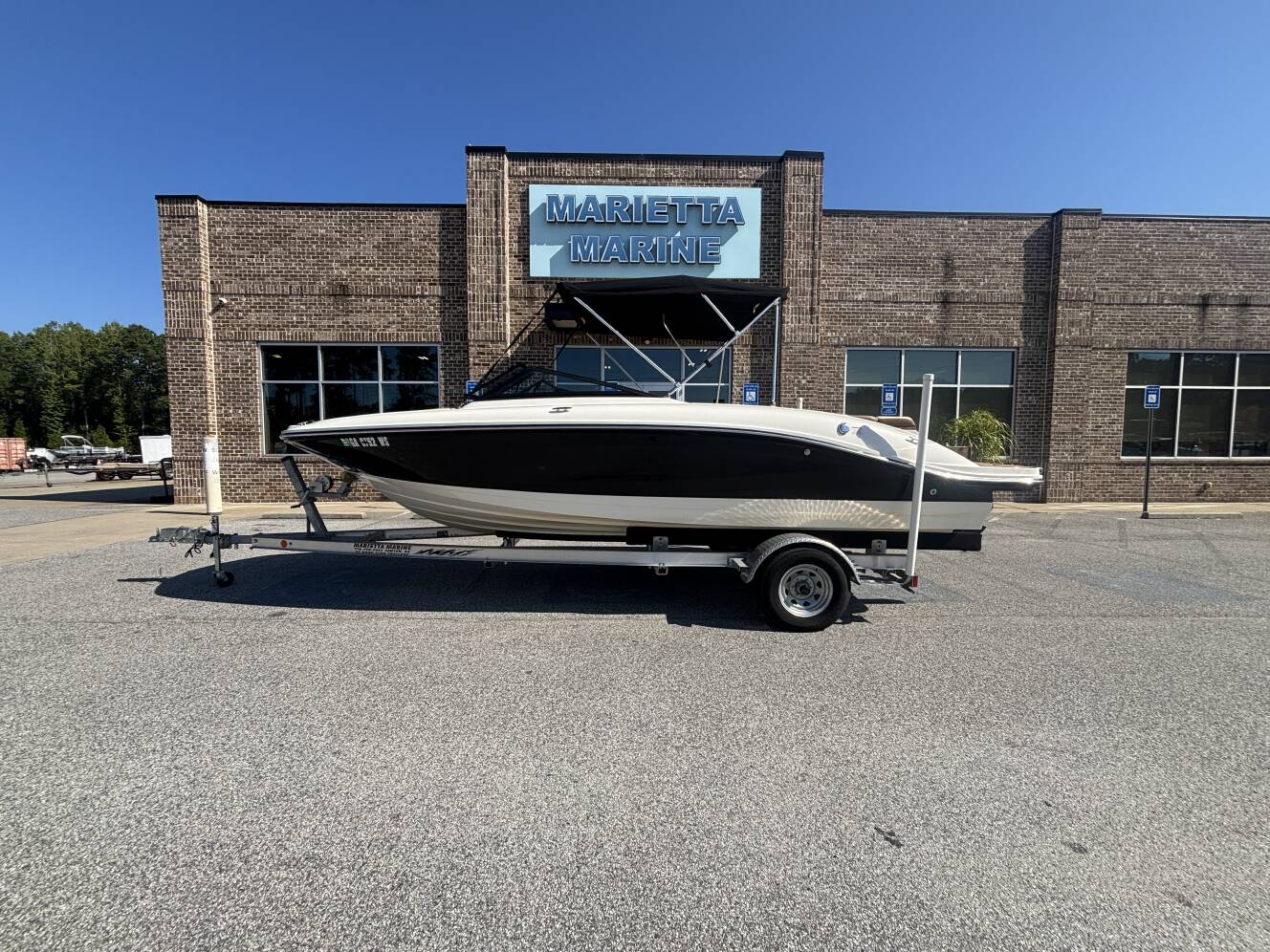 A photo of this 2018 Sea Ray 210 SPX w/MerCruiser 4.5L - 250HP Engine and Trailer