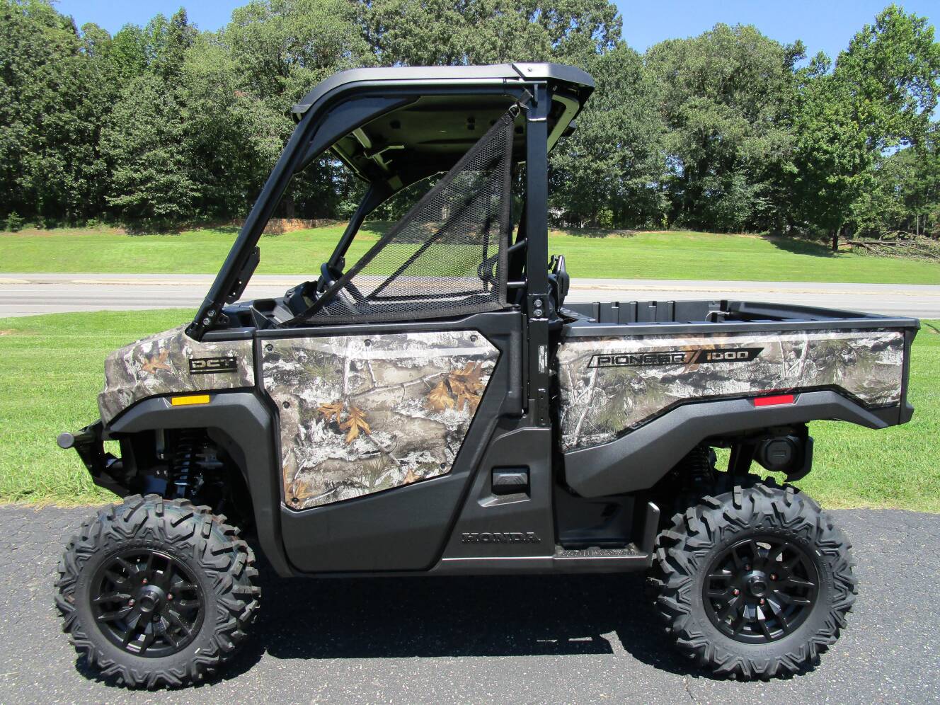 A photo of this 2026 Honda Pioneer 1000 Deluxe