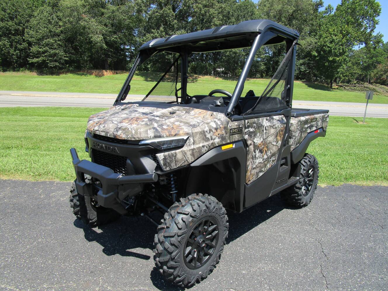 A photo of this 2026 Honda Pioneer 1000 Deluxe