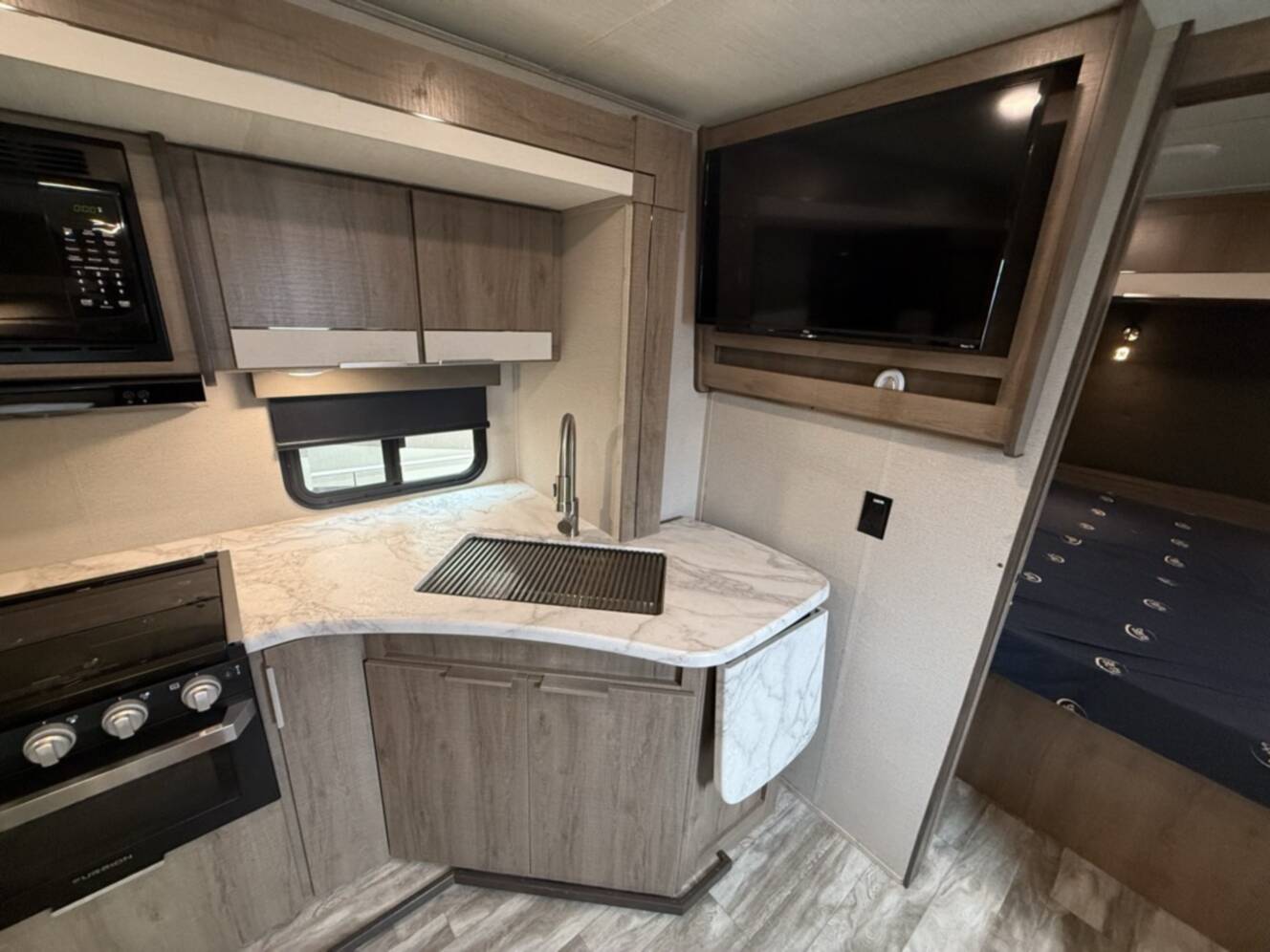 A photo of this 2021 Grand Design IMAGINE XLS 23BHE