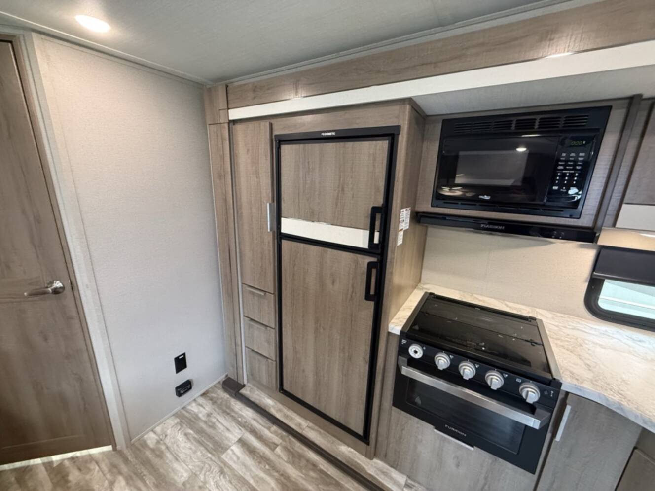 A photo of this 2021 Grand Design IMAGINE XLS 23BHE