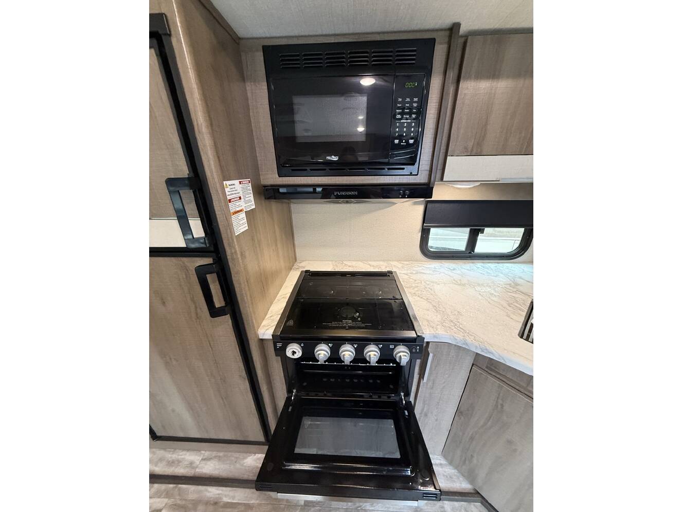 A photo of this 2021 Grand Design IMAGINE XLS 23BHE