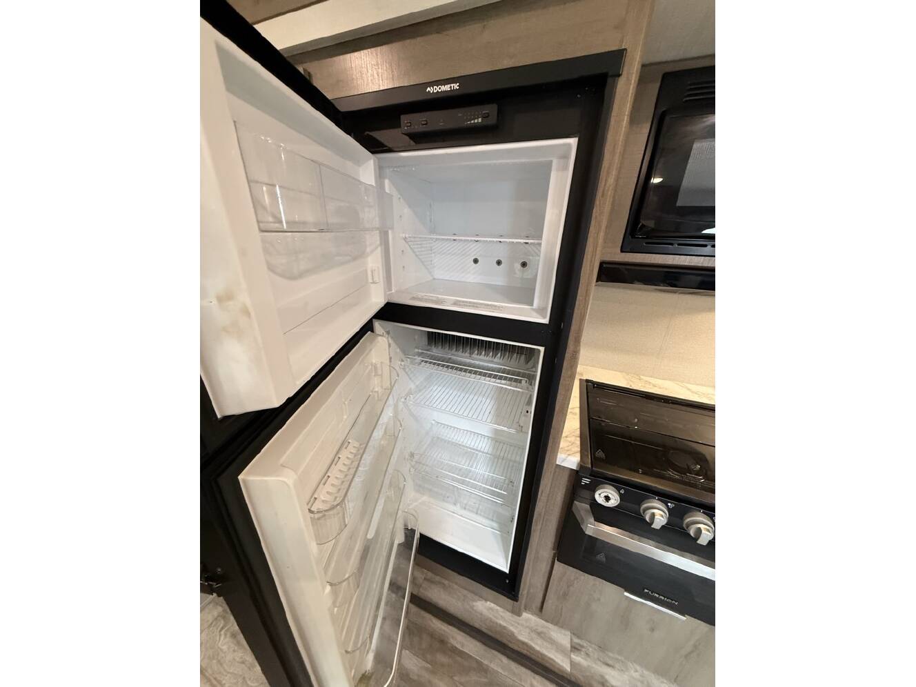 A photo of this 2021 Grand Design IMAGINE XLS 23BHE
