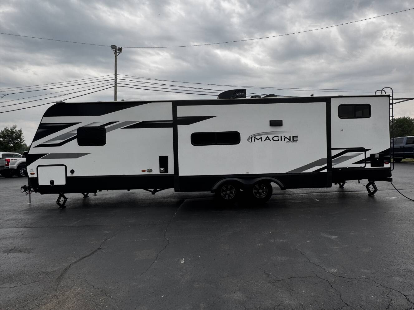 A photo of this 2023 Grand Design IMAGINE 3210BH
