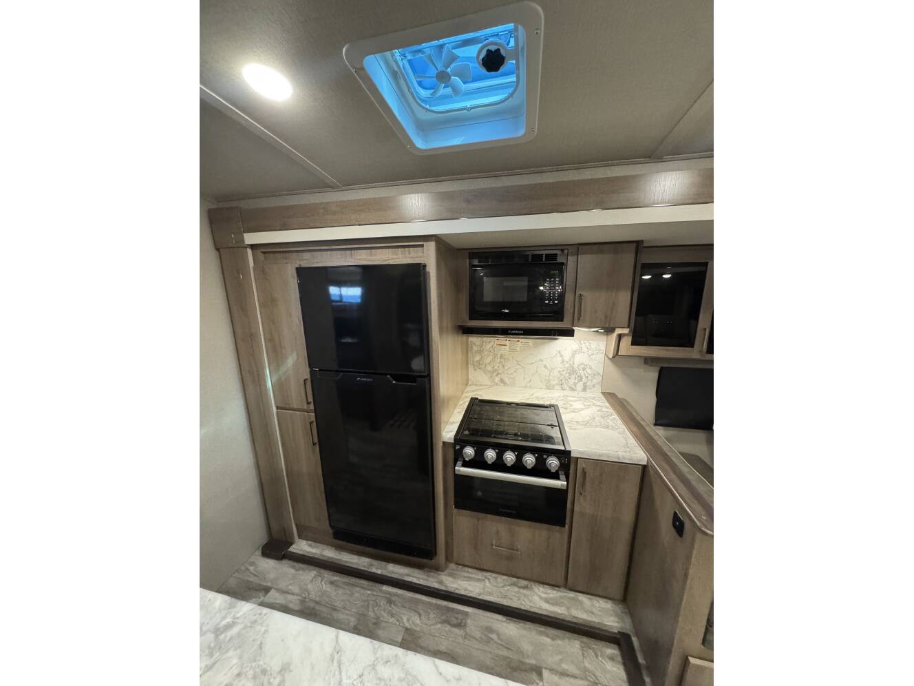 A photo of this 2023 Grand Design IMAGINE 3210BH