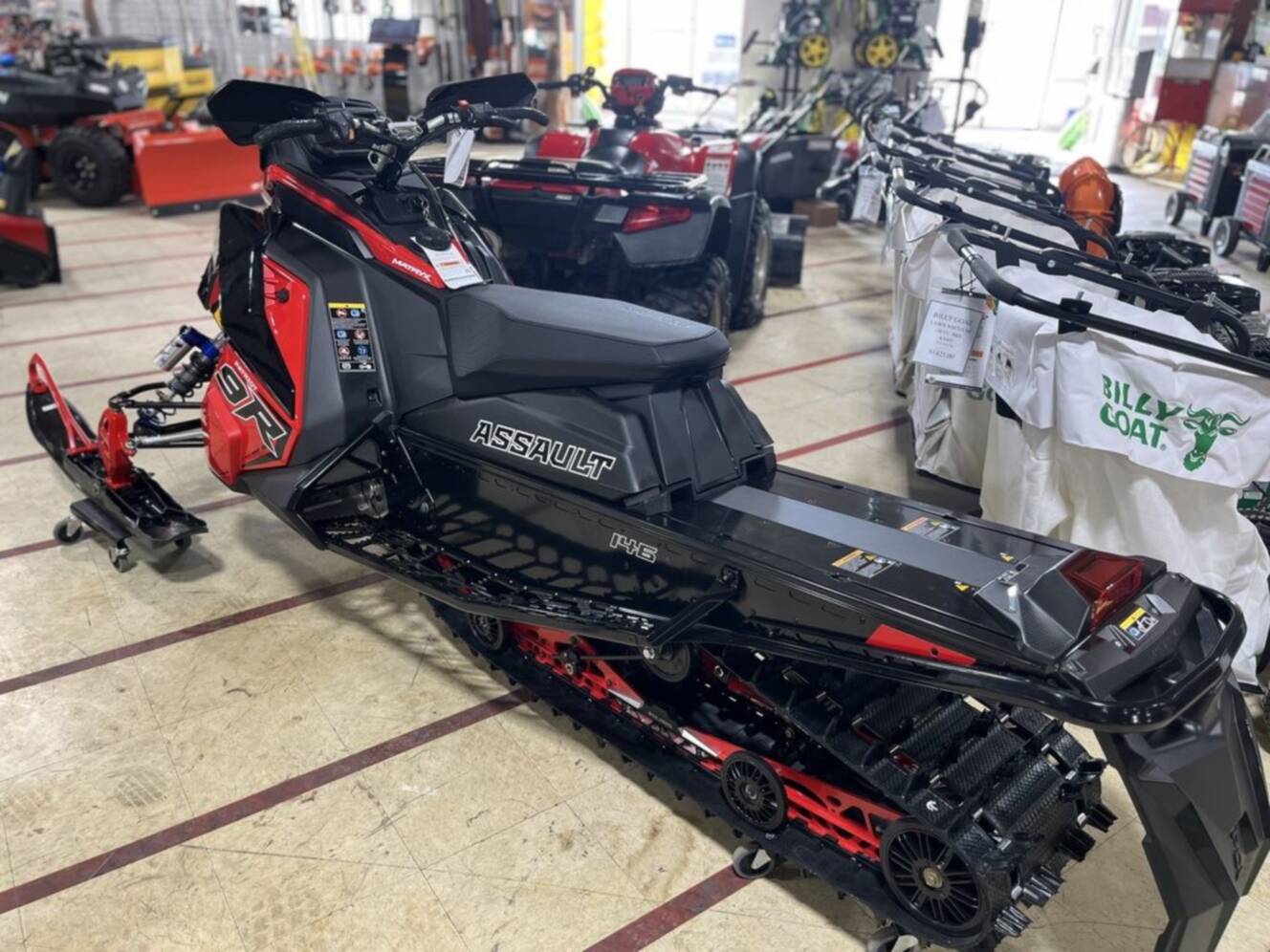 A photo of this 2026 Polaris® Patriot 9R Switchback Assault 146 - Race IFS Indy Red /