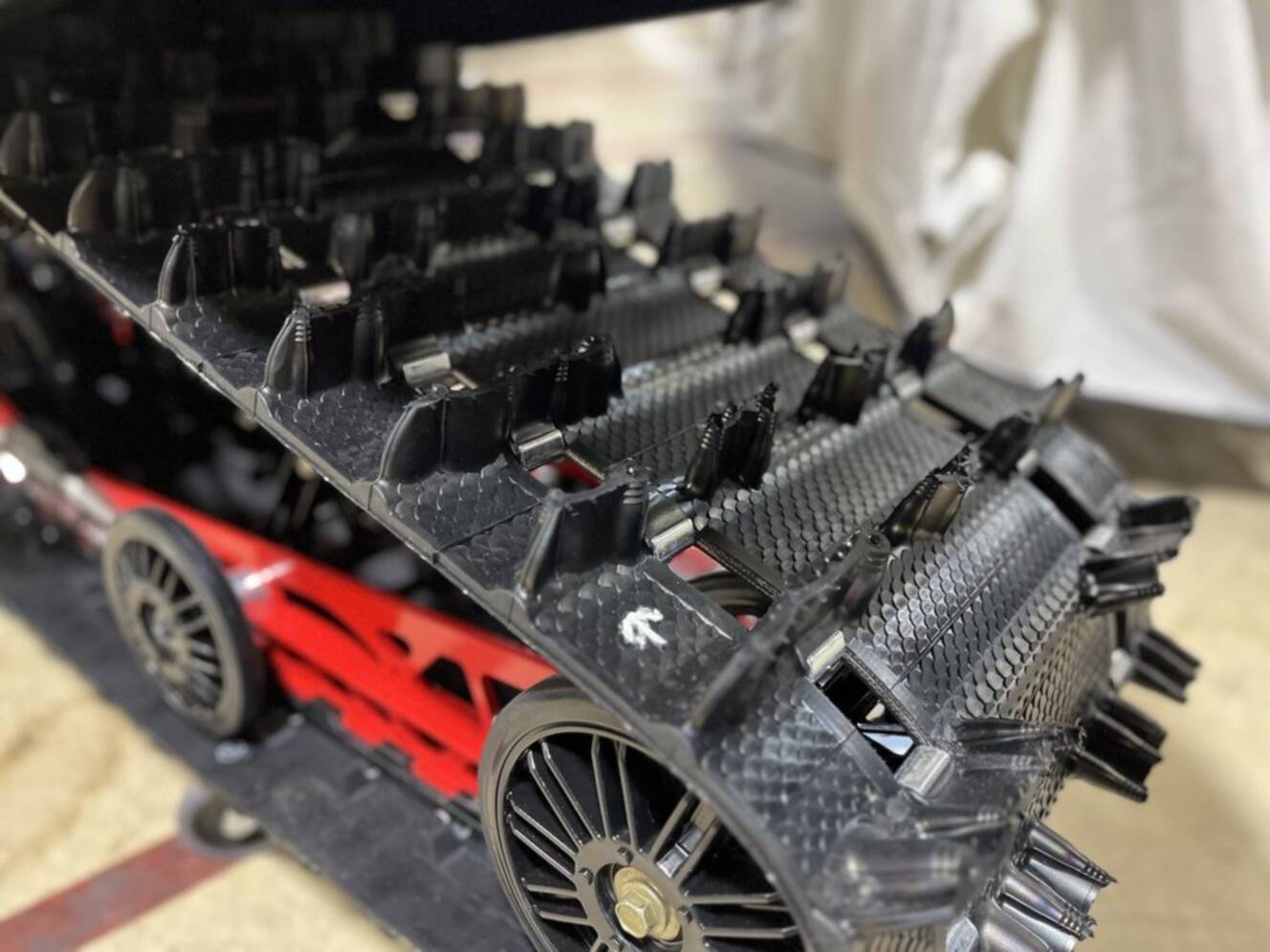 A photo of this 2026 Polaris® Patriot 9R Switchback Assault 146 - Race IFS Indy Red /