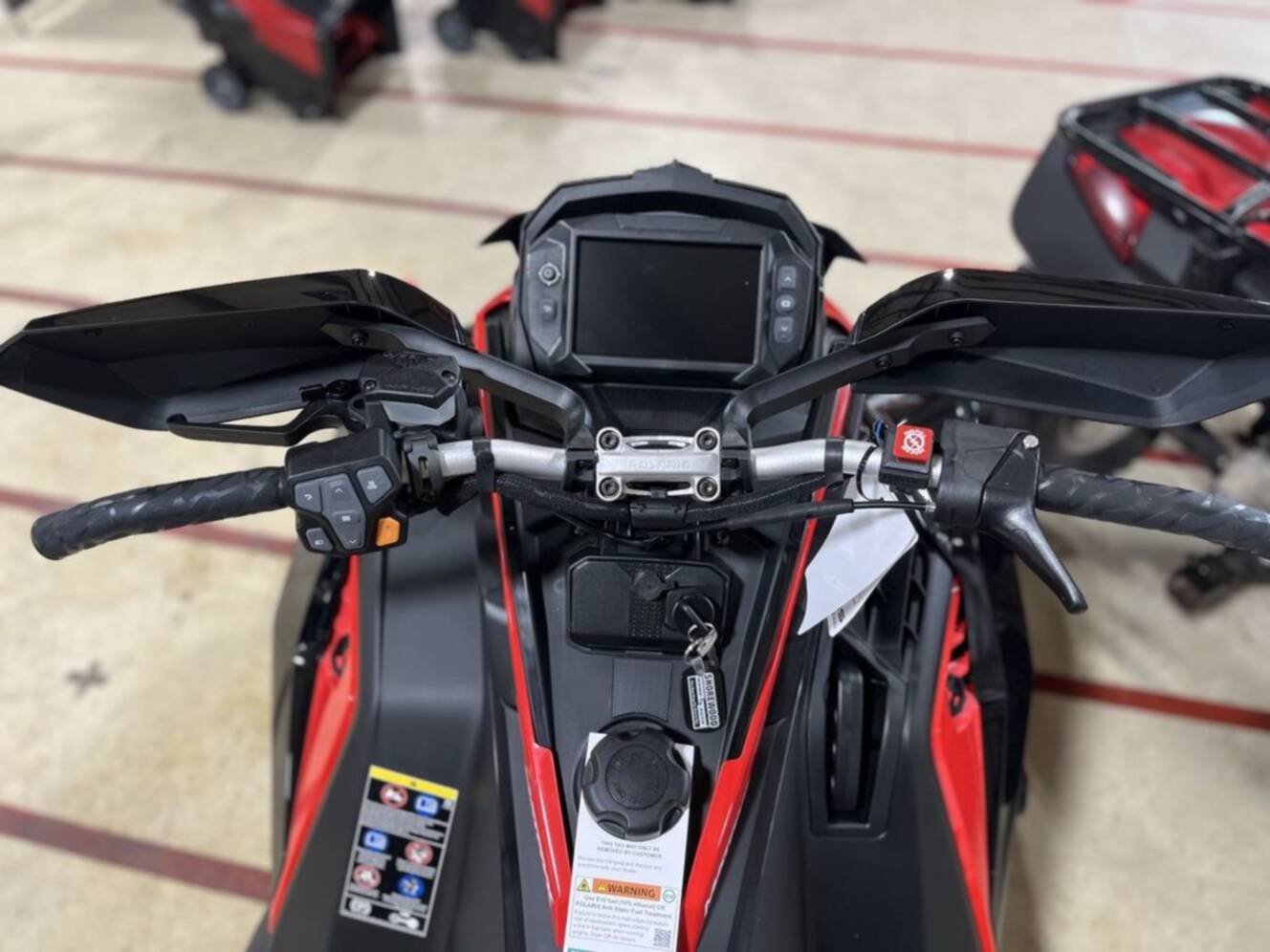 A photo of this 2026 Polaris® Patriot 9R Switchback Assault 146 - Race IFS Indy Red /