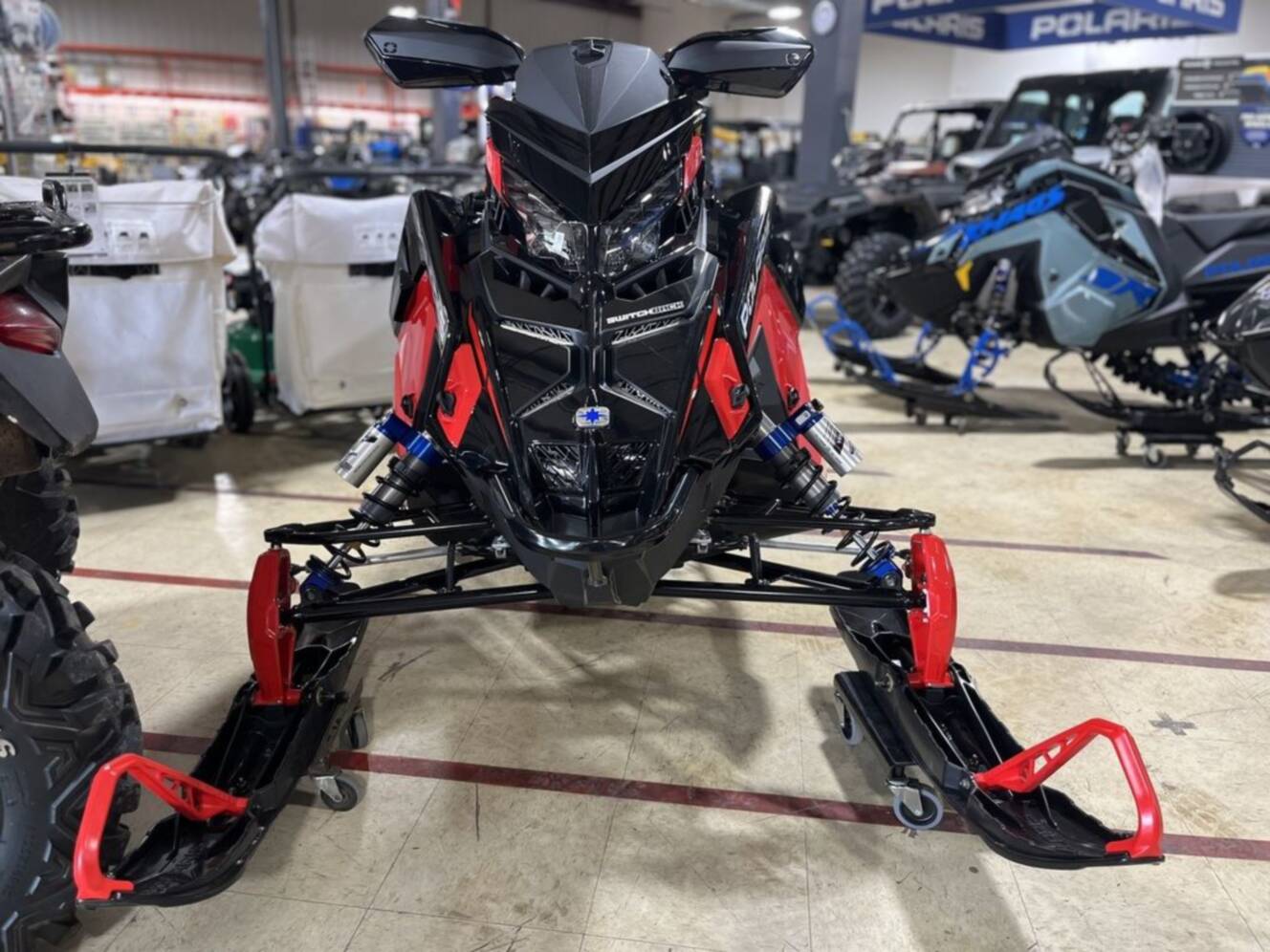 A photo of this 2026 Polaris® Patriot 9R Switchback Assault 146 - Race IFS Indy Red /