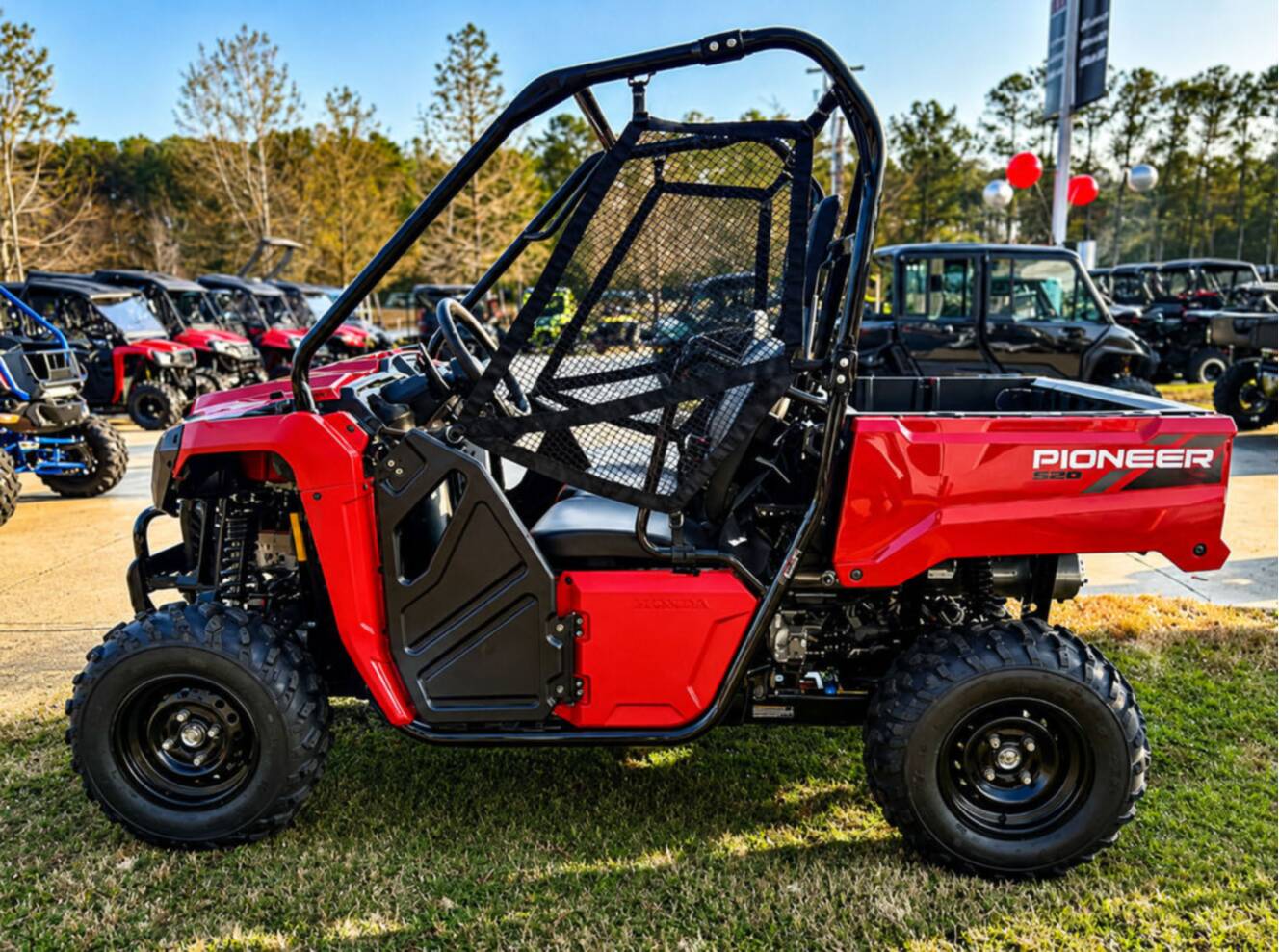 A photo of this 2026 Honda® Pioneer 520