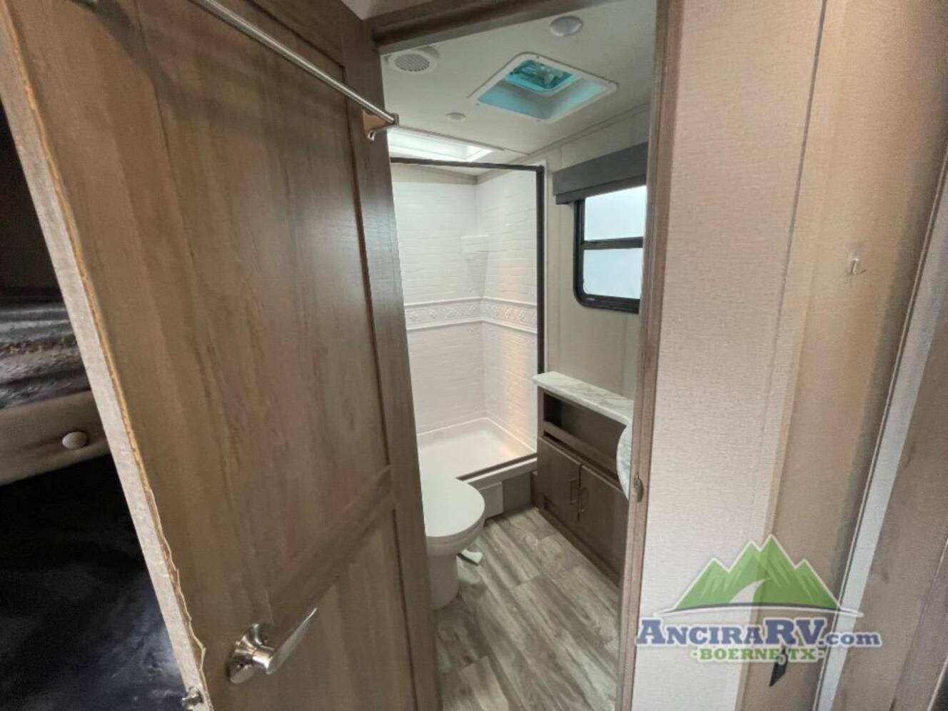 A photo of this 2021 Grand Design Imagine 2800BH