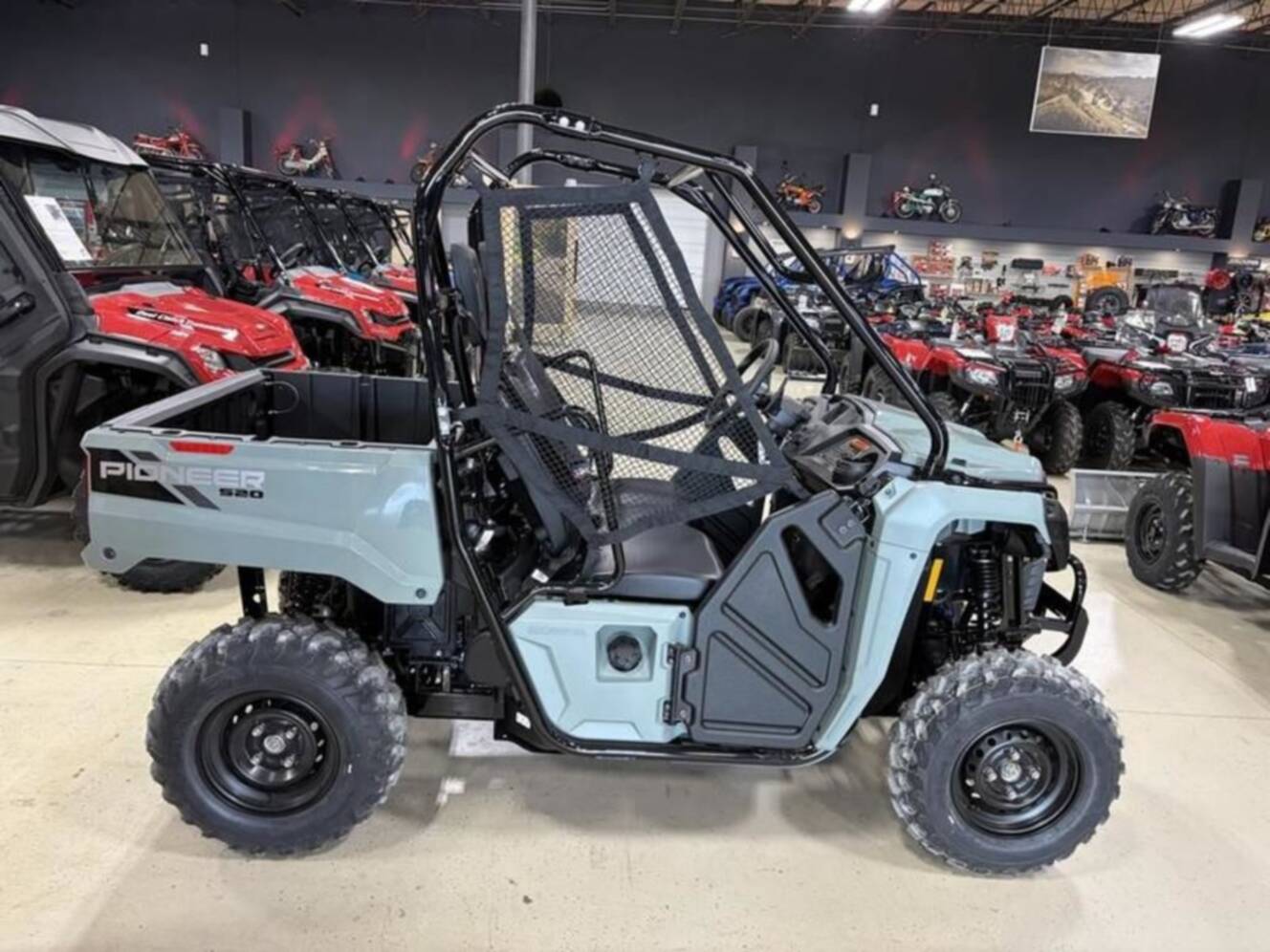 A photo of this 2026 Honda® Pioneer 520