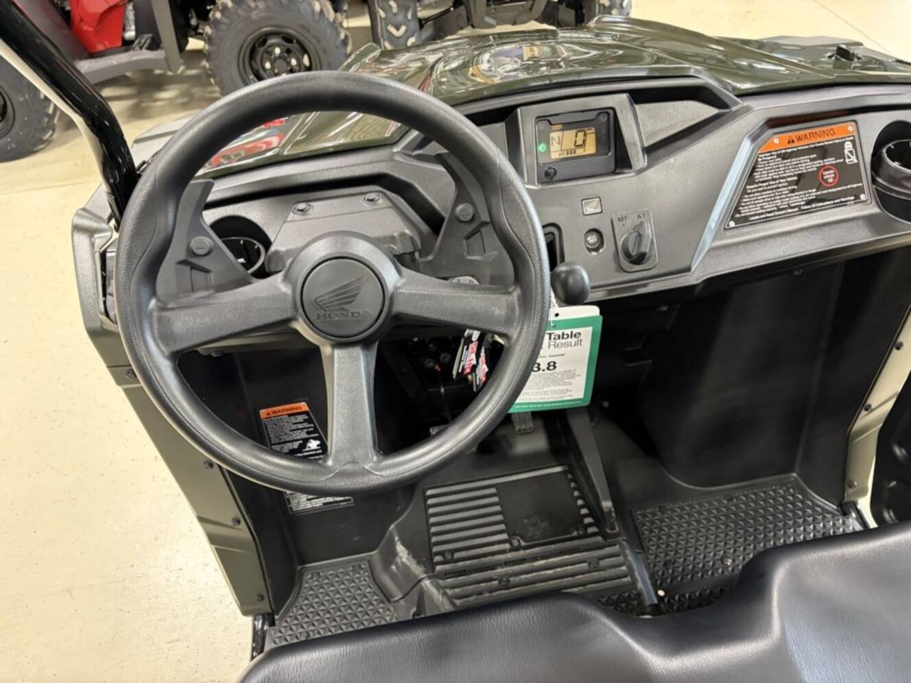 A photo of this 2026 Honda® Pioneer 520