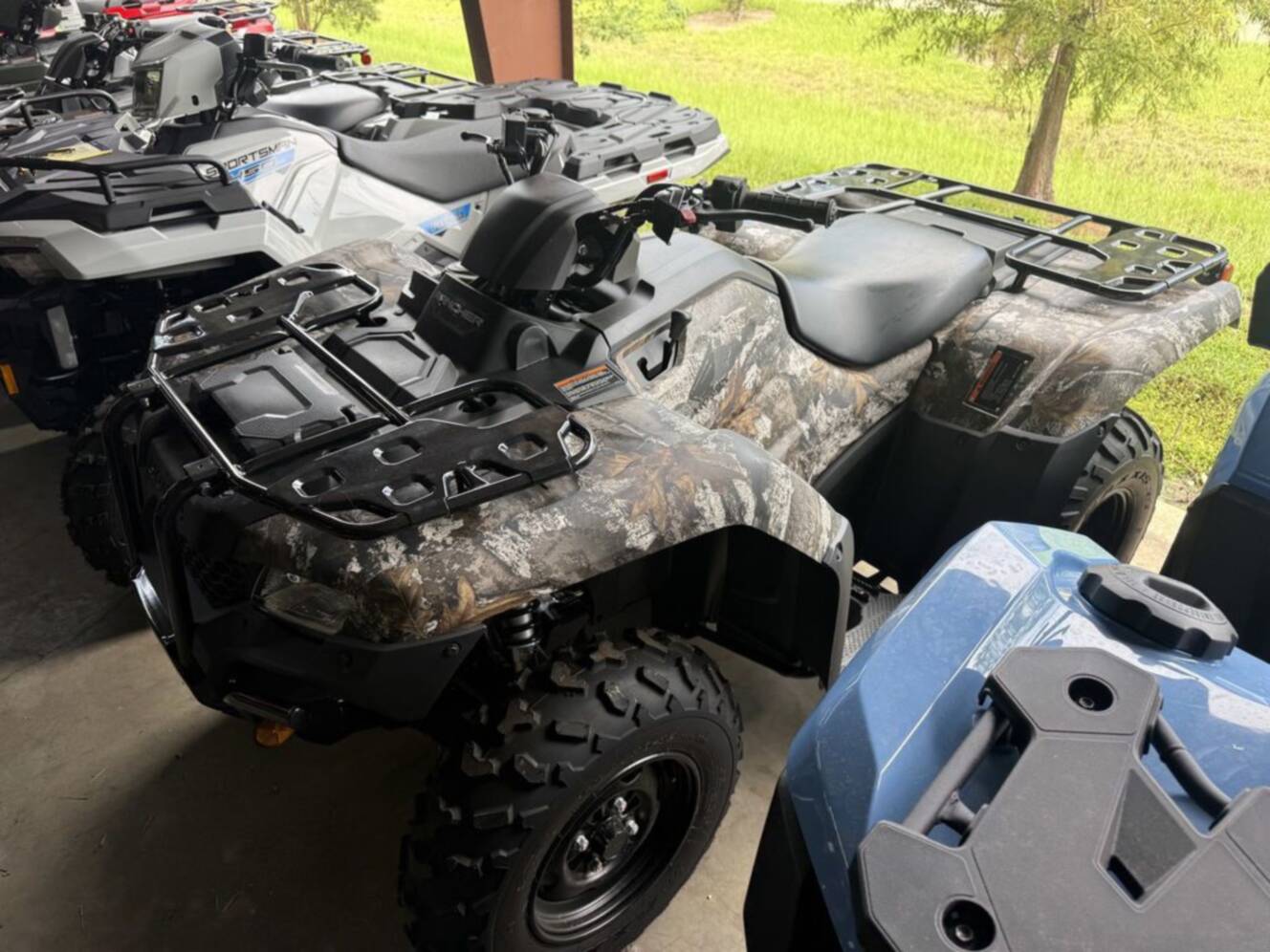 A photo of this 2027 Honda  FourTrax Rancher 4X4 TrueTimber Atera Camo