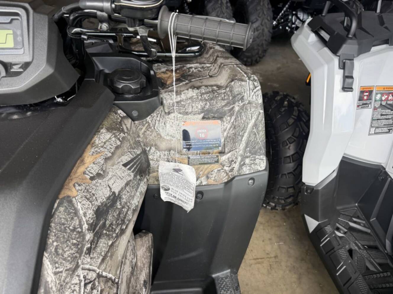 A photo of this 2027 Honda  FourTrax Rancher 4X4 TrueTimber Atera Camo