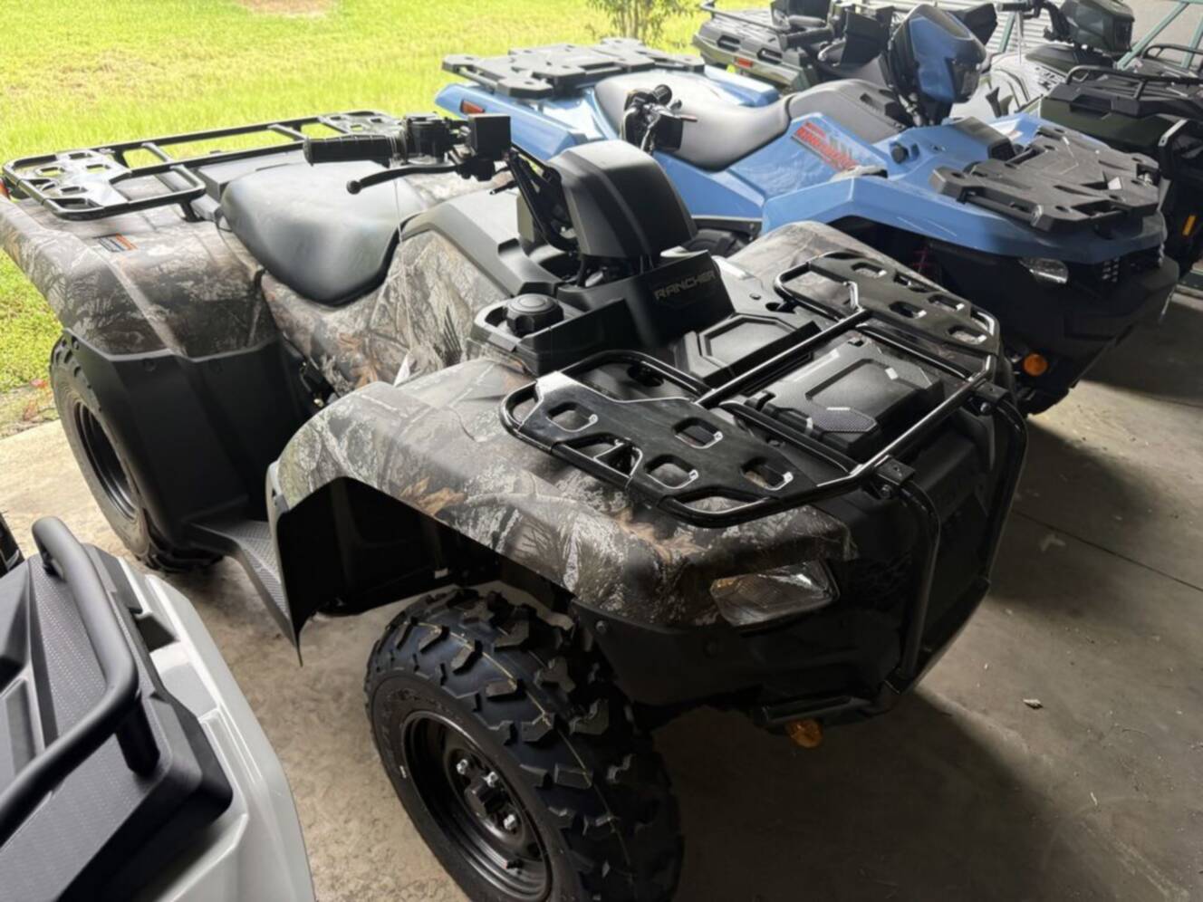 A photo of this 2027 Honda  FourTrax Rancher 4X4 TrueTimber Atera Camo