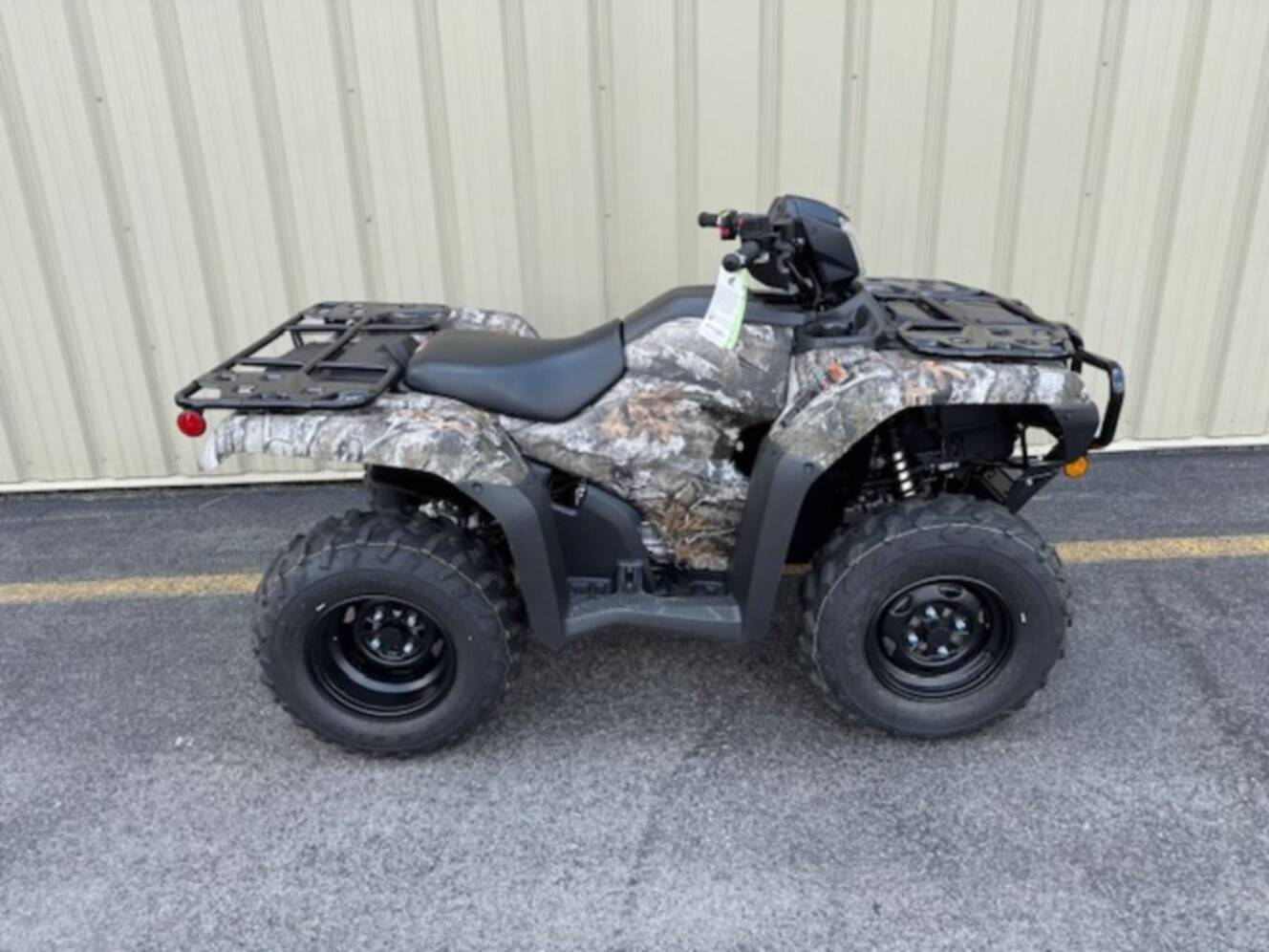 A photo of this 2027 Honda® FourTrax Foreman 4x4 EPS TrueTimber® Atera Camo