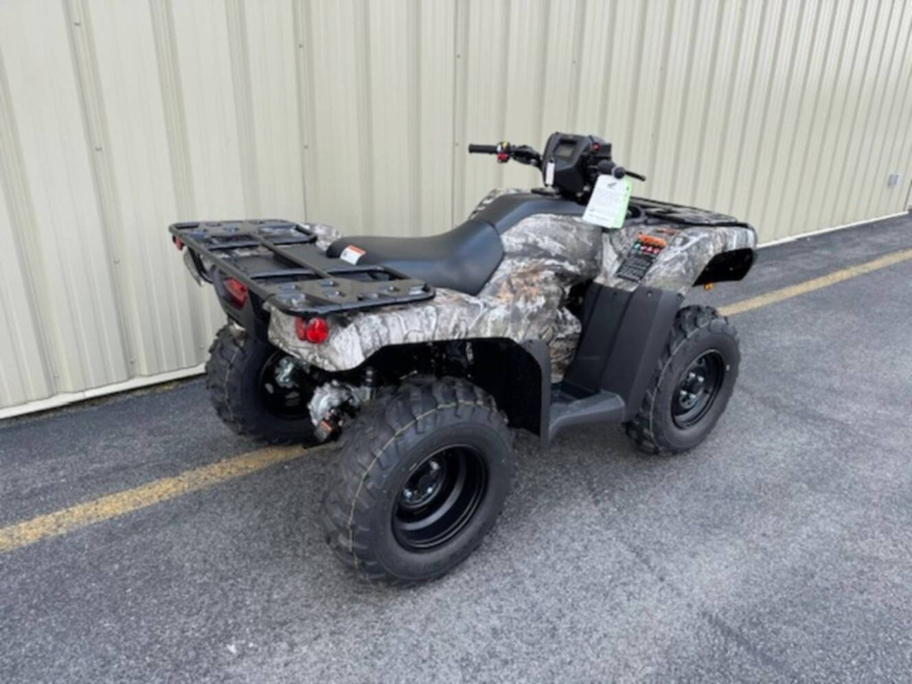 A photo of this 2027 Honda® FourTrax Foreman 4x4 EPS TrueTimber® Atera Camo
