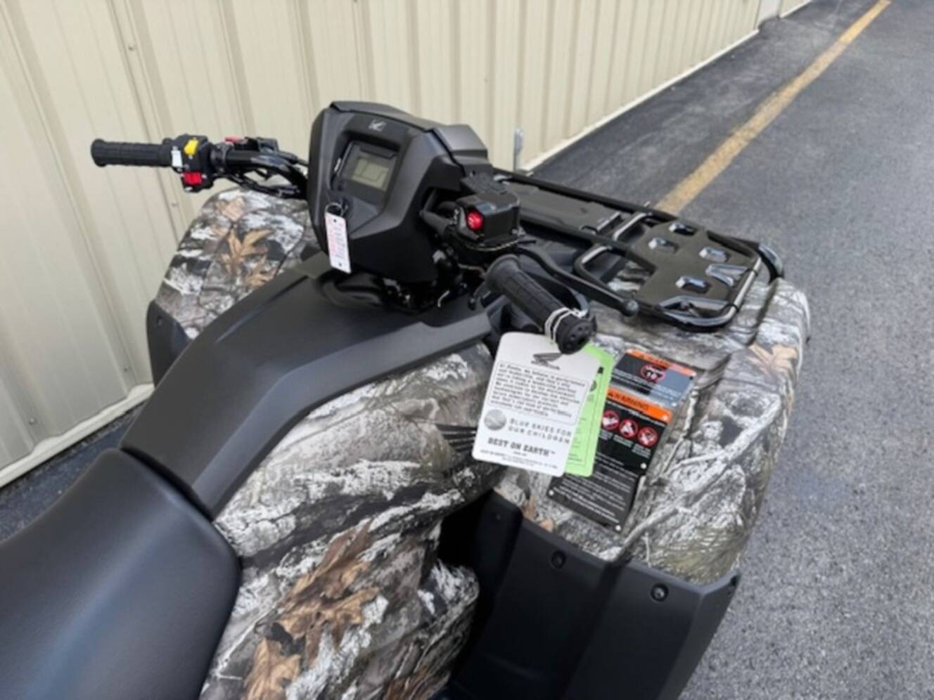 A photo of this 2027 Honda® FourTrax Foreman 4x4 EPS TrueTimber® Atera Camo