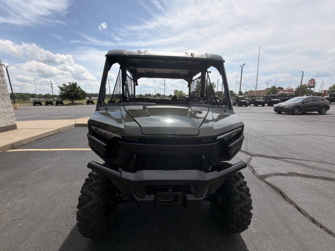 A photo of this 2026 Honda® Pioneer 1000-5 Deluxe