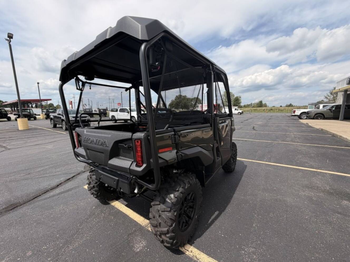 A photo of this 2026 Honda® Pioneer 1000-5 Deluxe