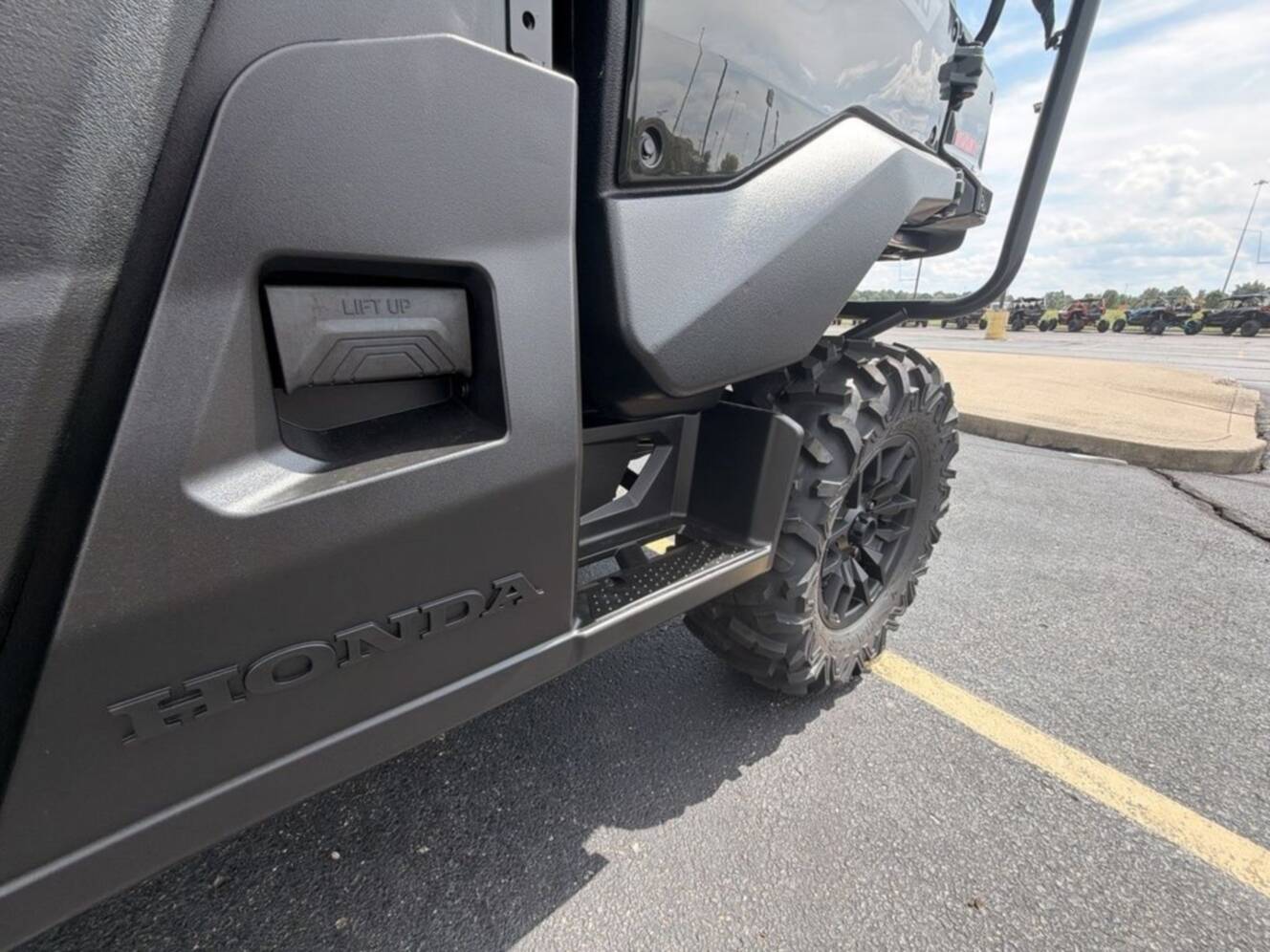A photo of this 2026 Honda® Pioneer 1000-5 Deluxe