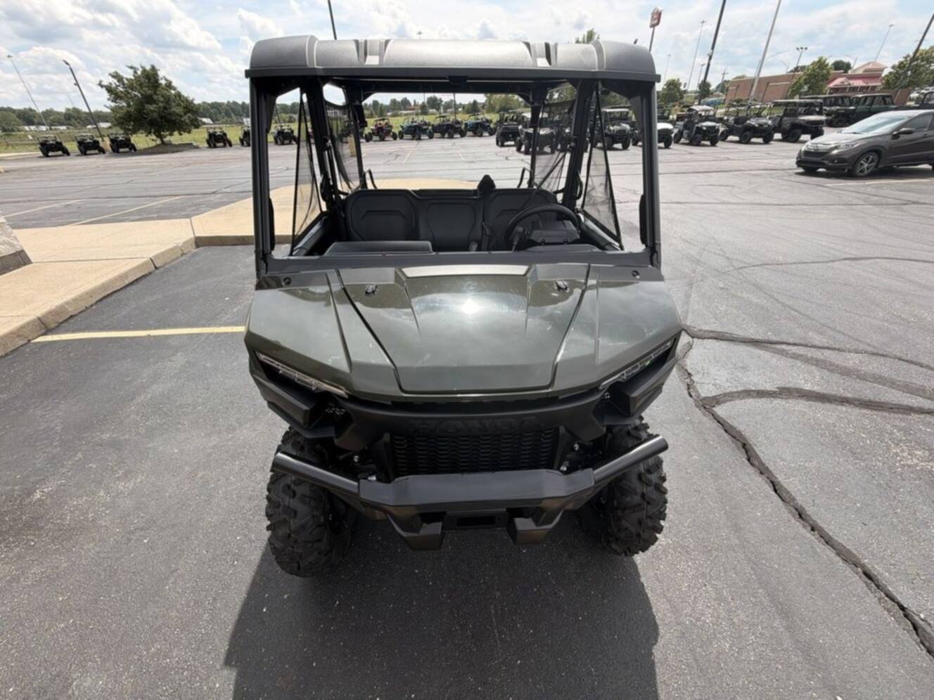 A photo of this 2026 Honda® Pioneer 1000-5 Deluxe