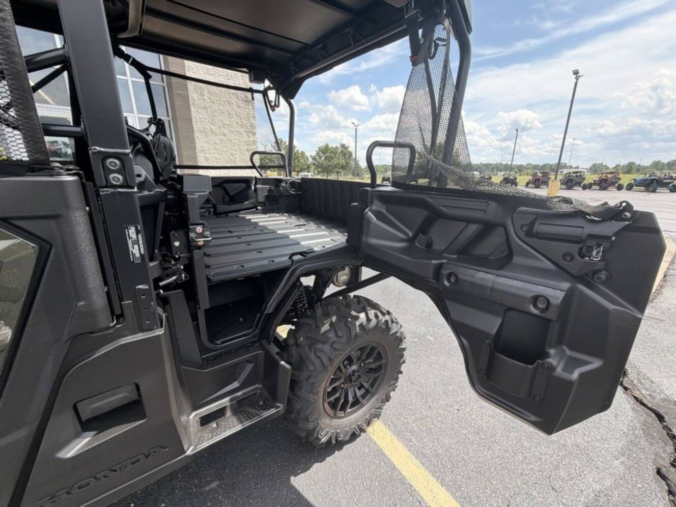 A photo of this 2026 Honda® Pioneer 1000-5 Deluxe