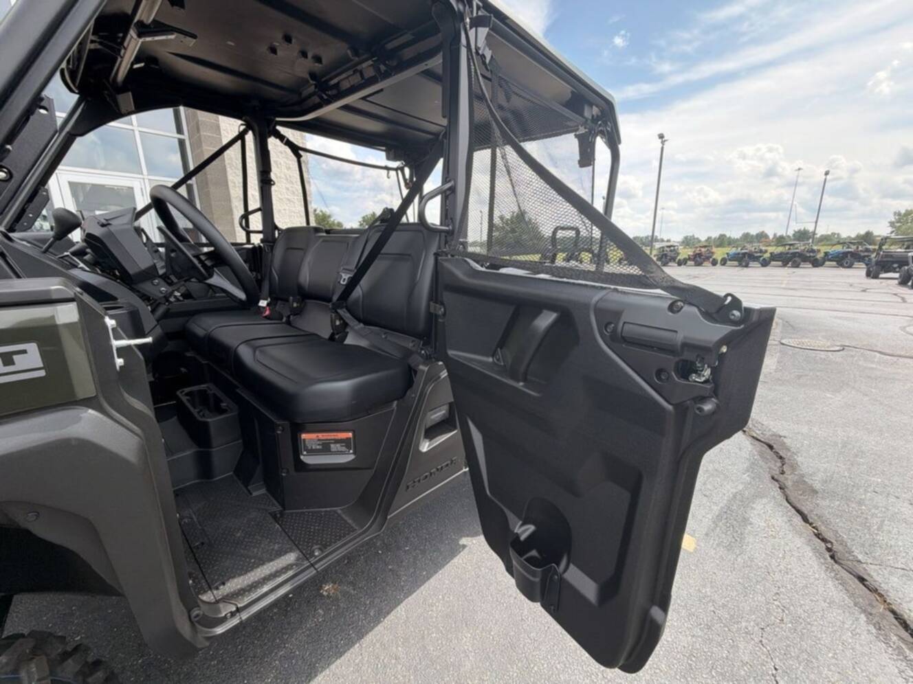 A photo of this 2026 Honda® Pioneer 1000-5 Deluxe