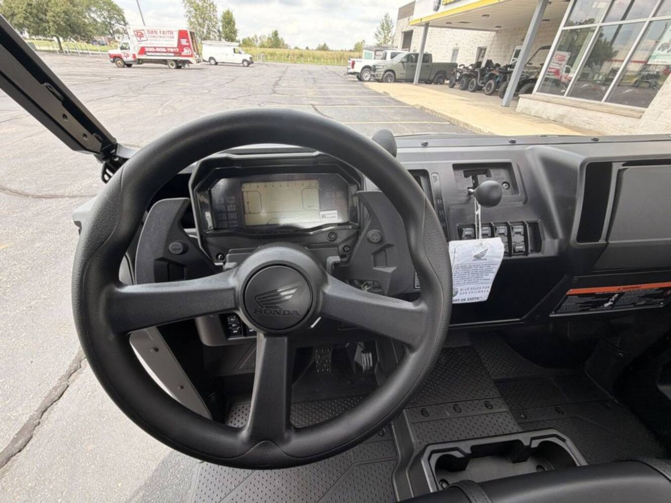 A photo of this 2026 Honda® Pioneer 1000-5 Deluxe