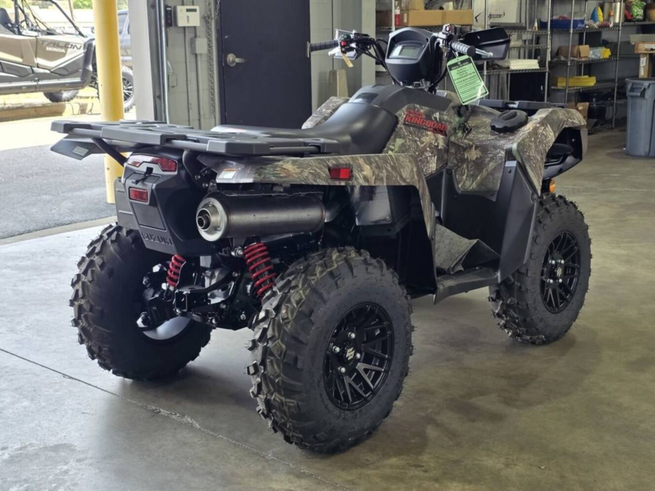 A photo of this 2025 Suzuki KingQuad 500AXi Power Steering SE Camo