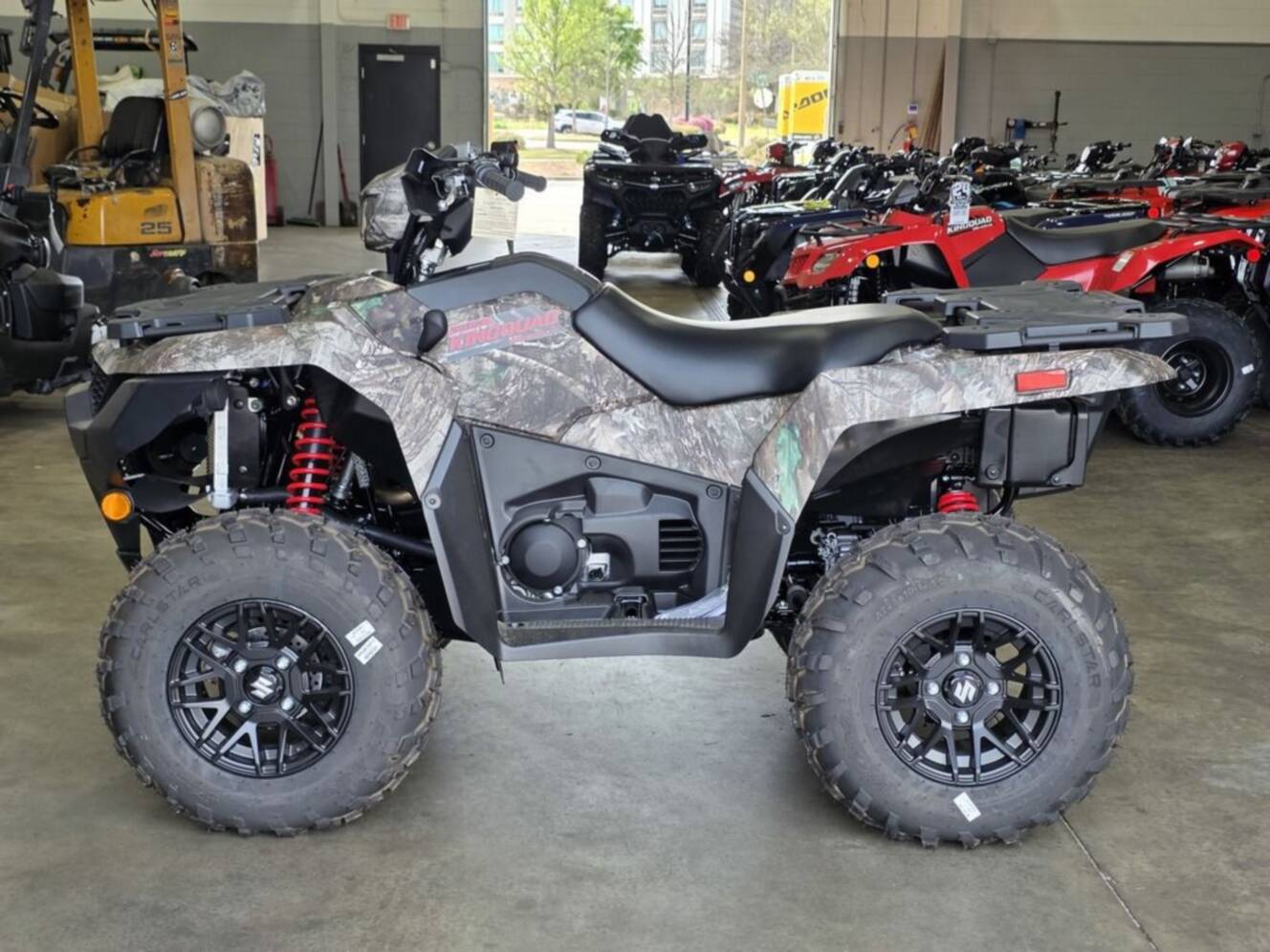 A photo of this 2025 Suzuki KingQuad 500AXi Power Steering SE Camo