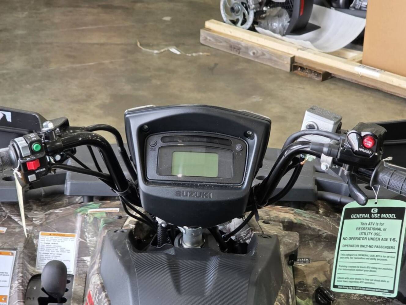 A photo of this 2025 Suzuki KingQuad 500AXi Power Steering SE Camo