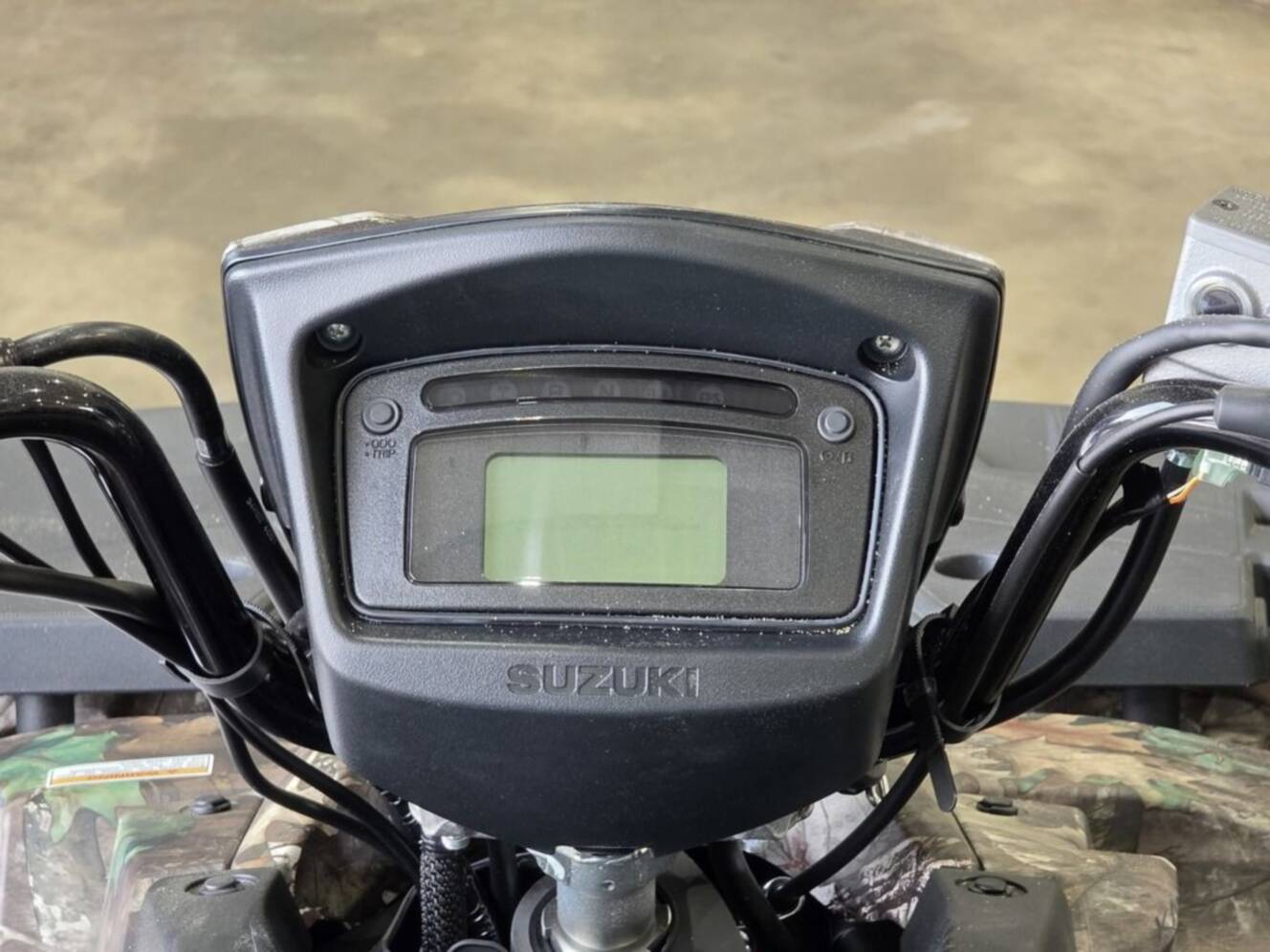 A photo of this 2025 Suzuki KingQuad 500AXi Power Steering SE Camo