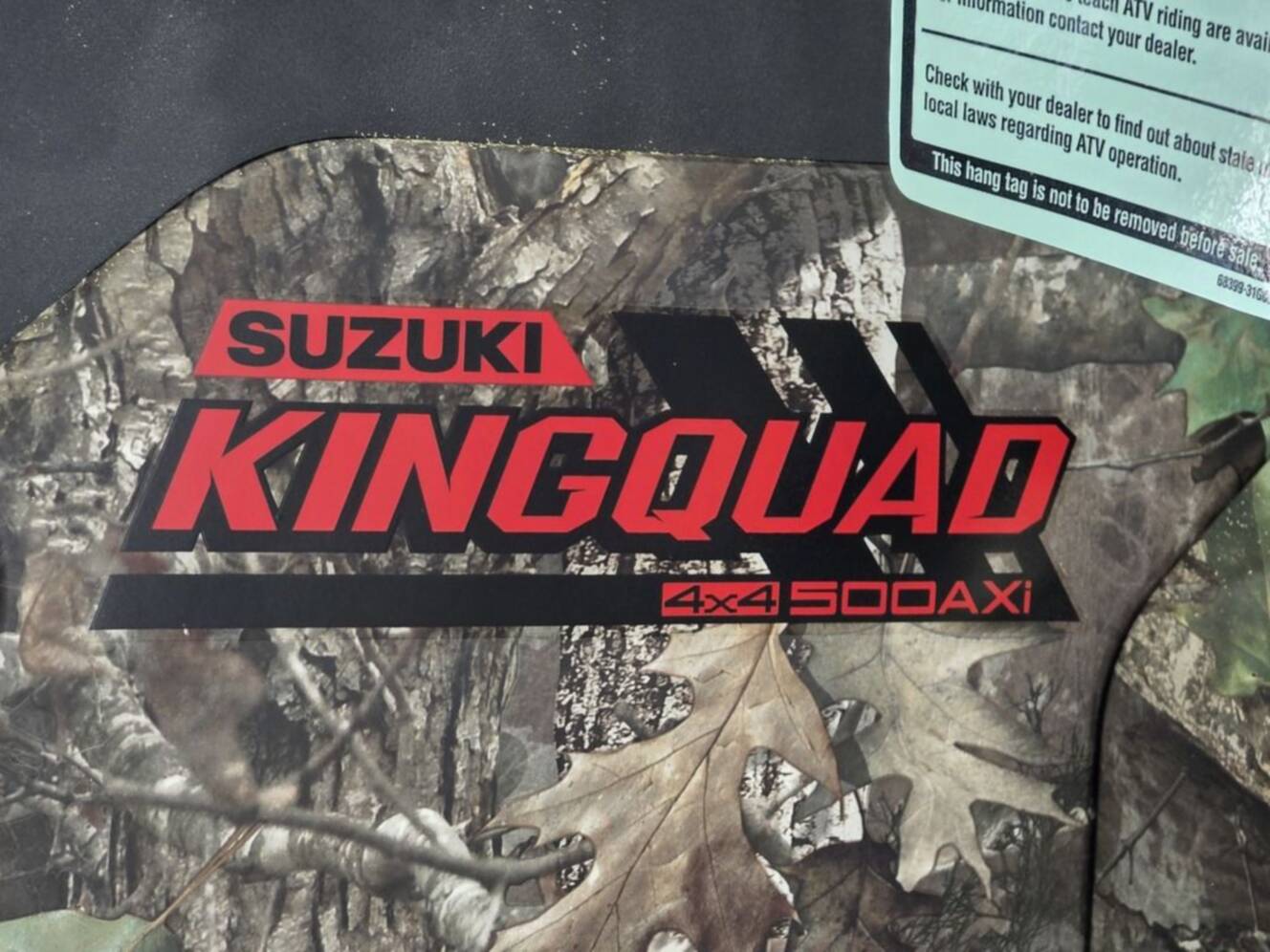 A photo of this 2025 Suzuki KingQuad 500AXi Power Steering SE Camo