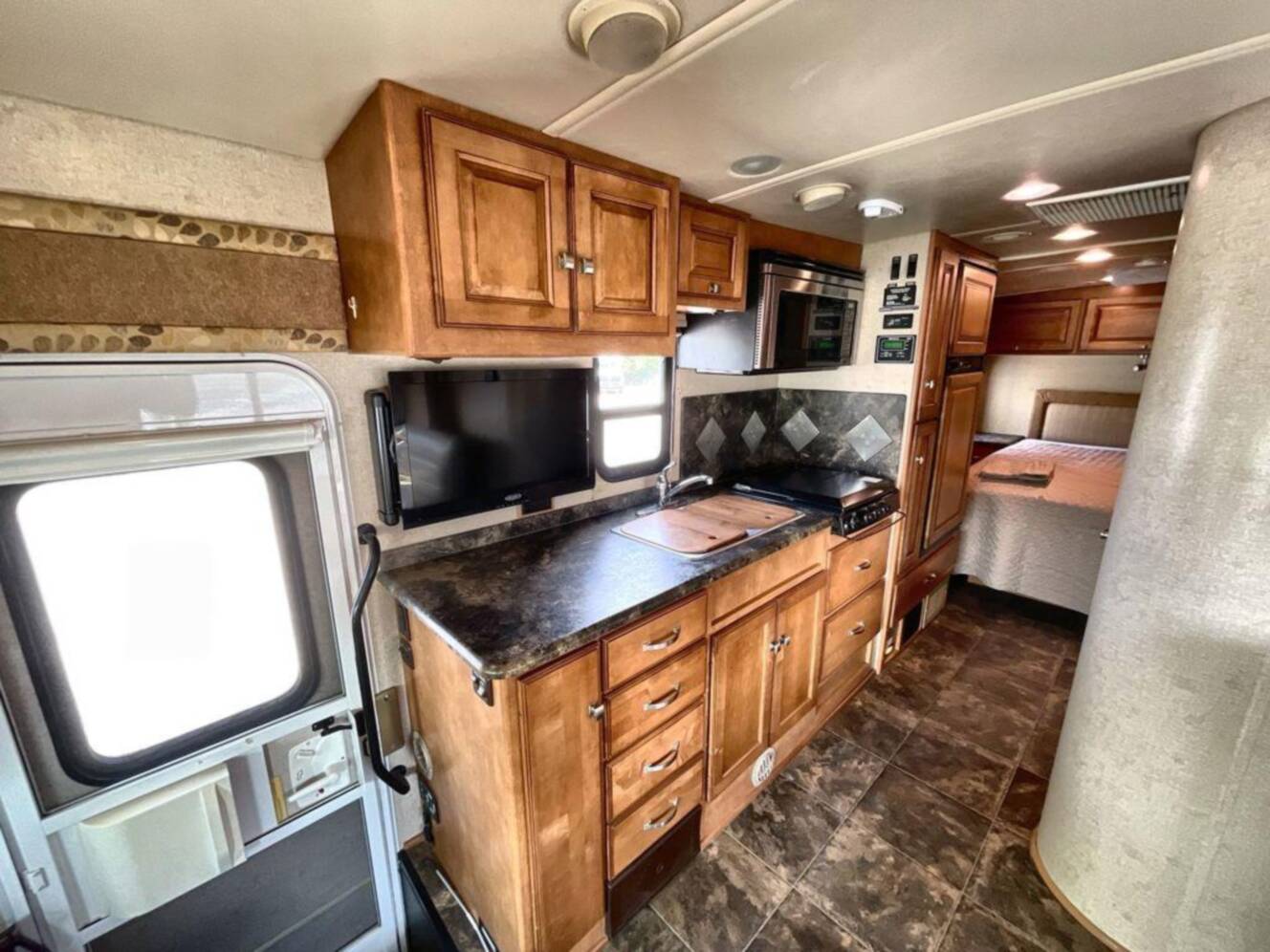 A photo of this 2013 Itasca Cambria 27K