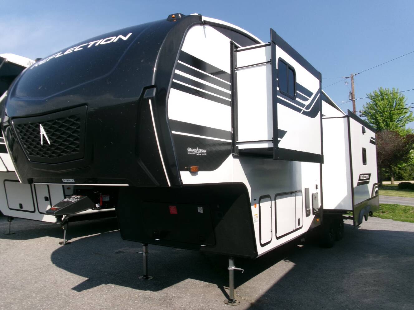 A photo of this 2026 Grand Design Reflection 303RLS