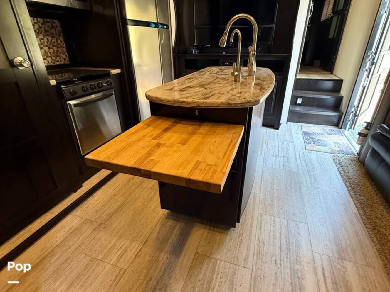 A photo of this 2016 Grand Design Momentum 385TH