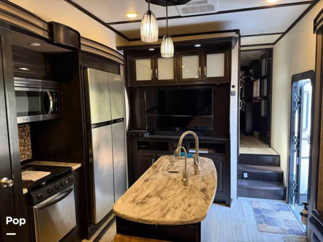 A photo of this 2016 Grand Design Momentum 385TH