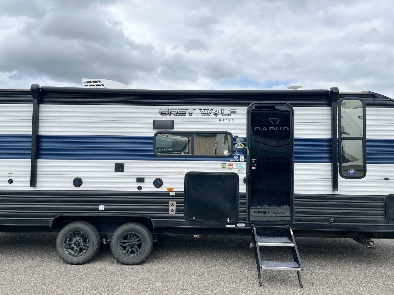 A photo of this 2023 Forest River GREY WOLF 26DBH