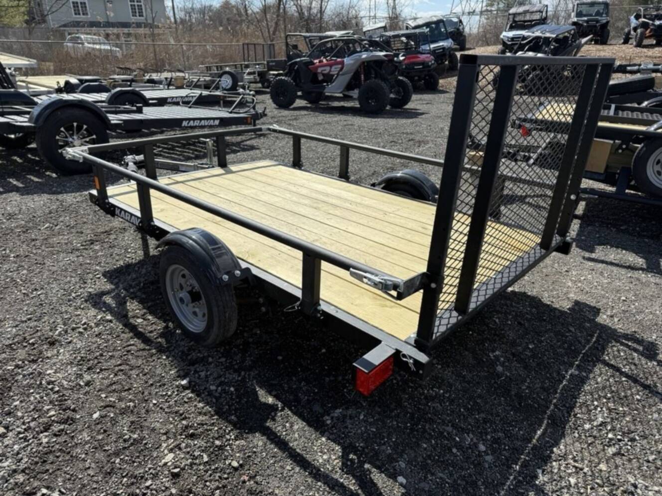 A photo of this 2026 Karavan Utility Light Trailers 5 x 8 ft. Steel w/ Slide Rail