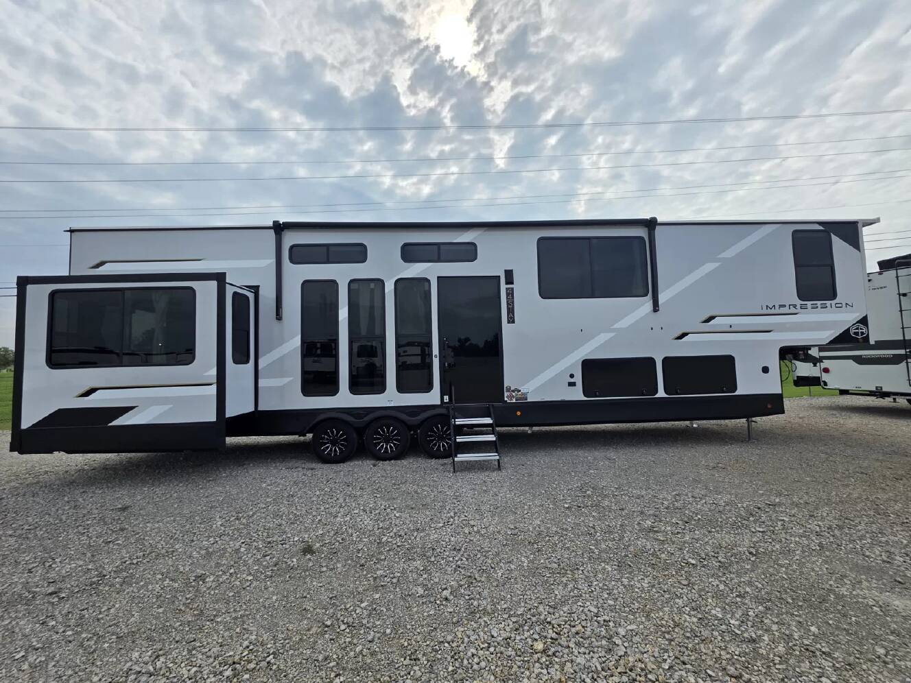A photo of this 2027 Forest River Rv IMPRESSION 44STAY