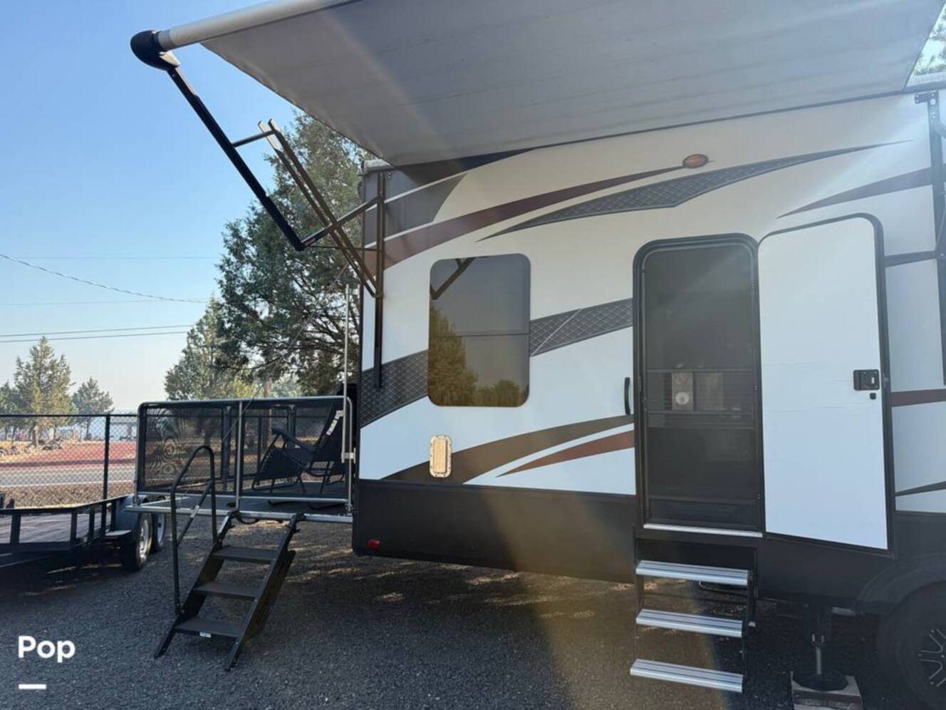 A photo of this 2016 Grand Design Momentum 385TH