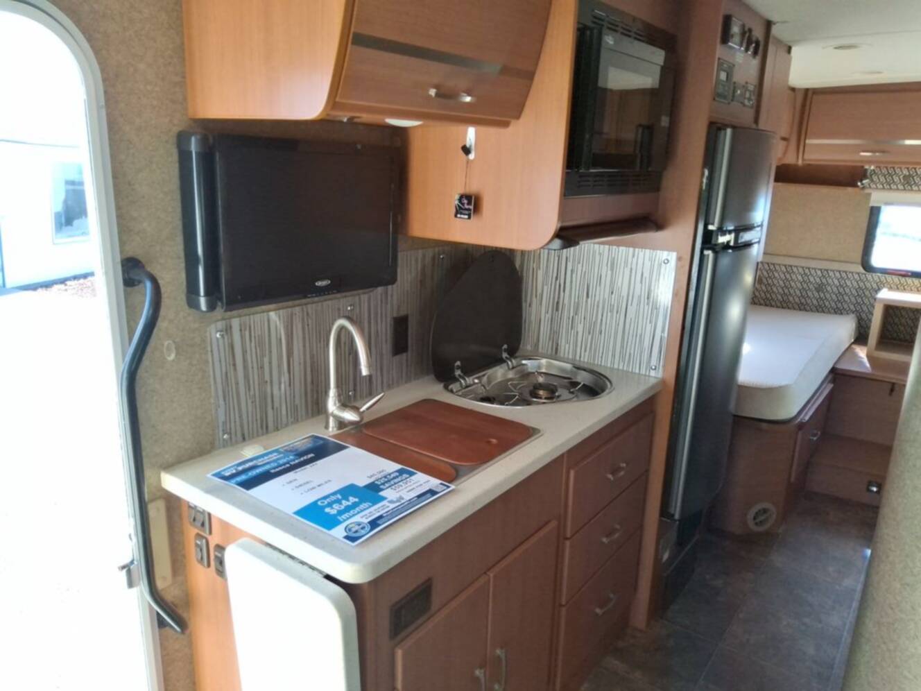 A photo of this 2014 Itasca NAVION 24V