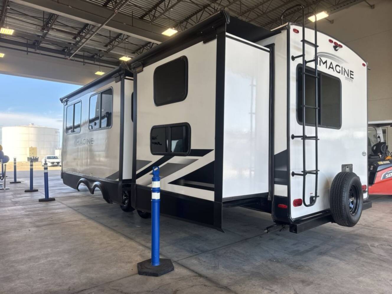A photo of this 2023 Grand Design Imagine 3250BH